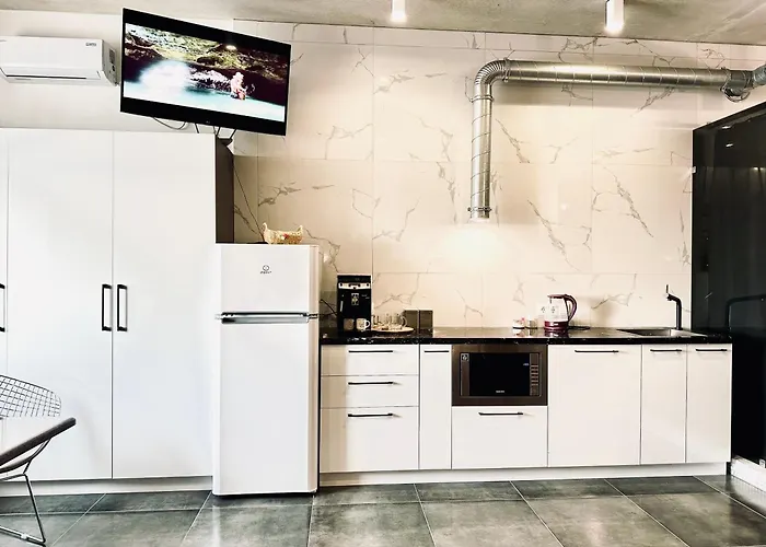Modern Apartments With A Coffee Machine In The City Center, A View Of The City