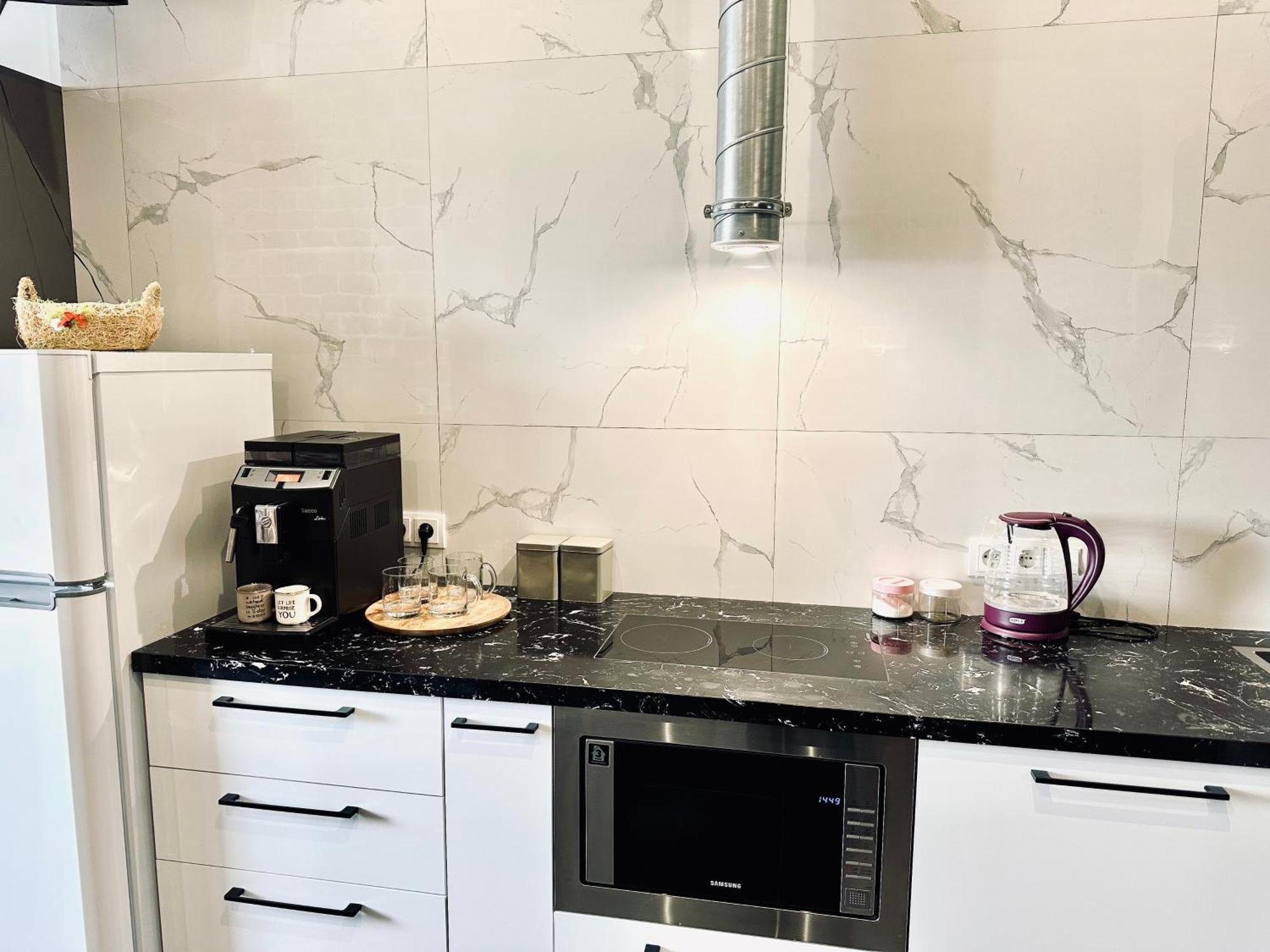 Modern With A Coffee Machine In The Center, A View Of The Rivne