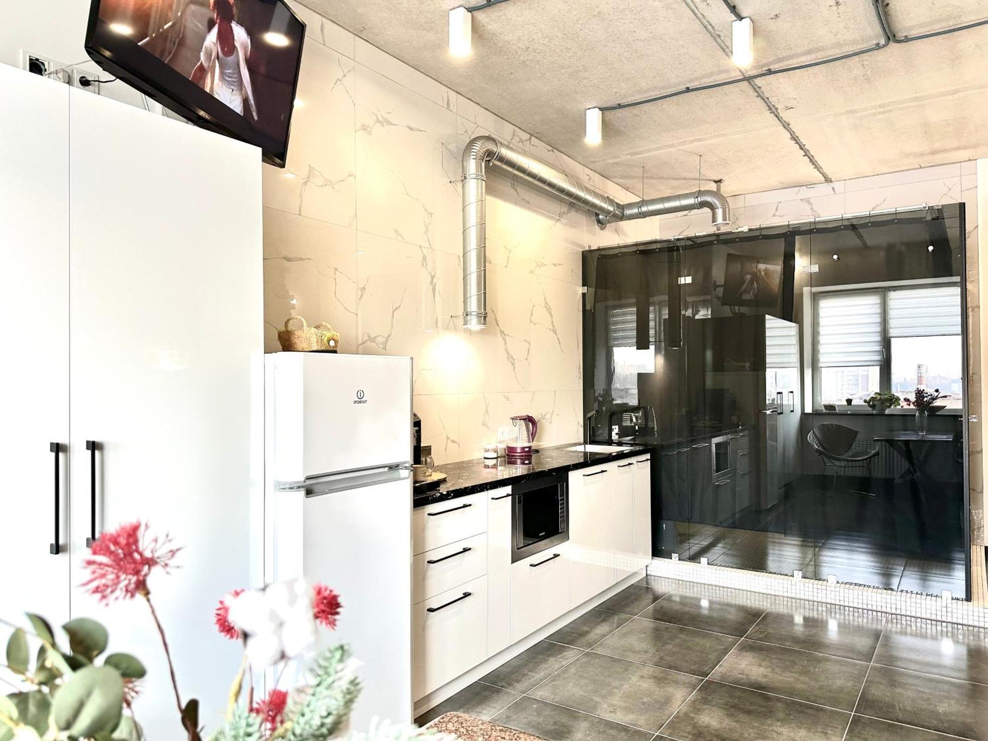 Apartment Modern With A Coffee Machine In The Center, A View Of The *